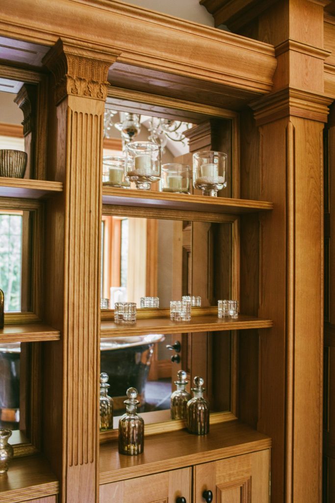 Oak and mirror classical cabinet with columns