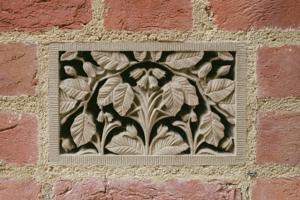 Stone carving with British flowers