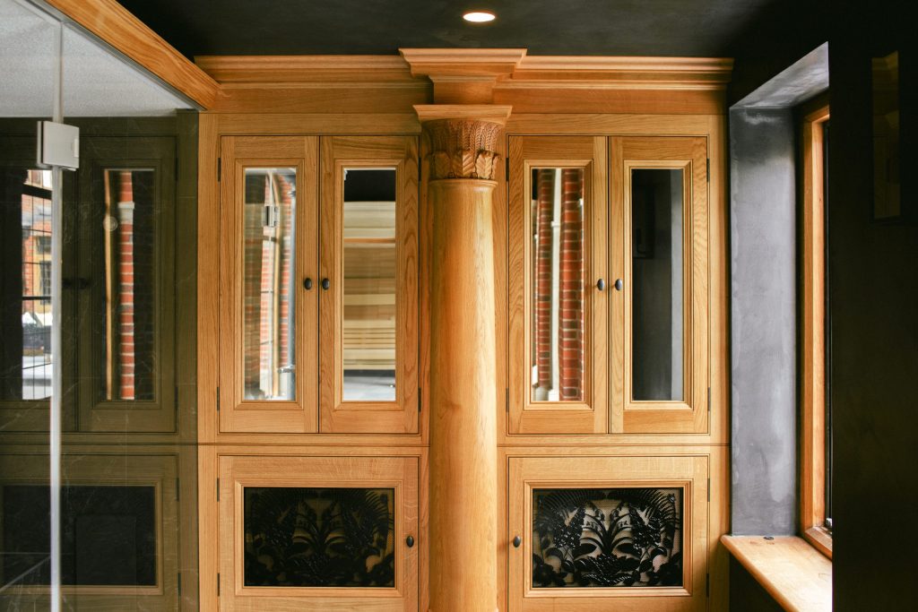Bespoke Oak carved cupboard with mirrors