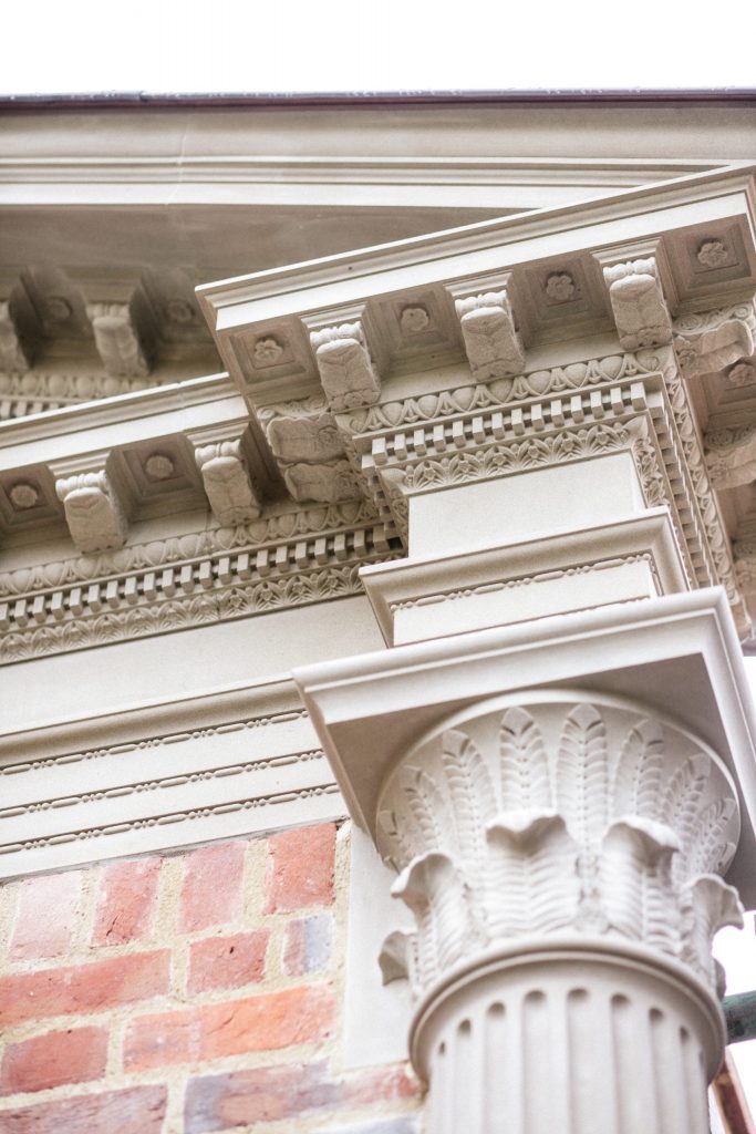 Ornate stone carved classical garden building