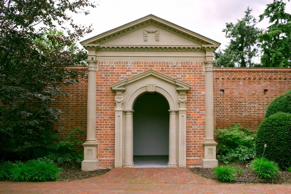 Classical garden folly building in estate grounds