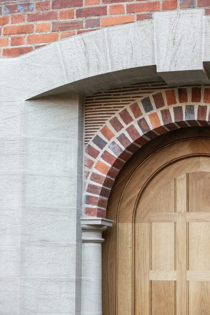 Arts and Crafts Oak front door Arts and Crafts Oak front door with stone and brick arch