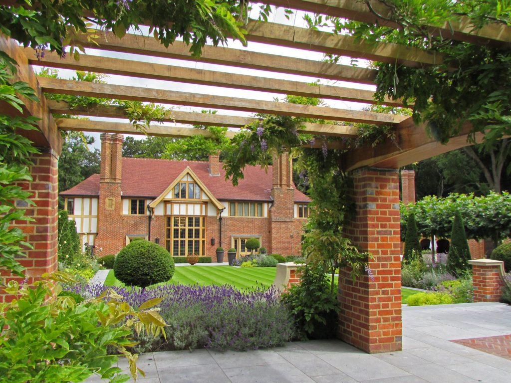 Country house Arts and Crafts garden wisteria