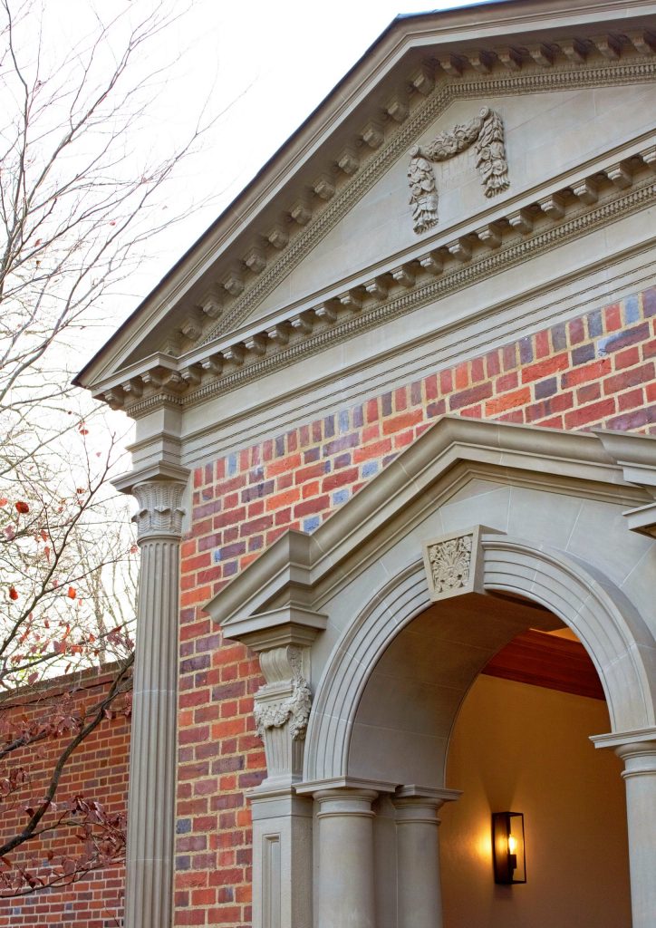 Classical garden building with ornate stone carving