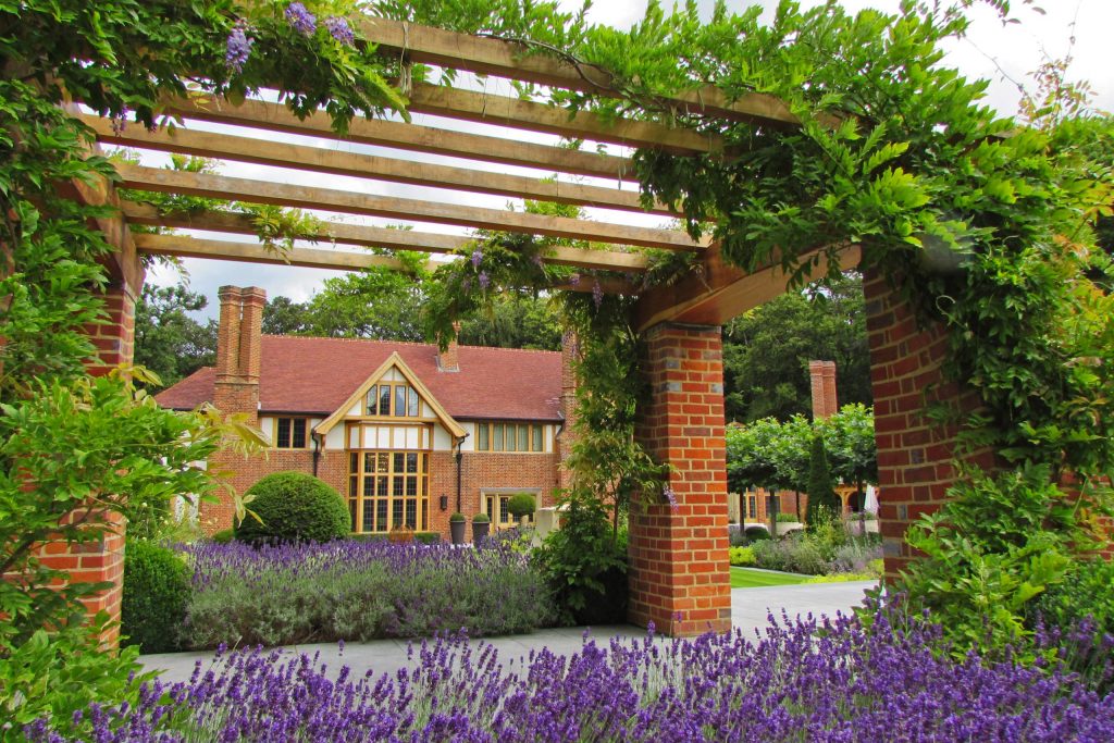 Arts and Crafts brick and Oak loggia design