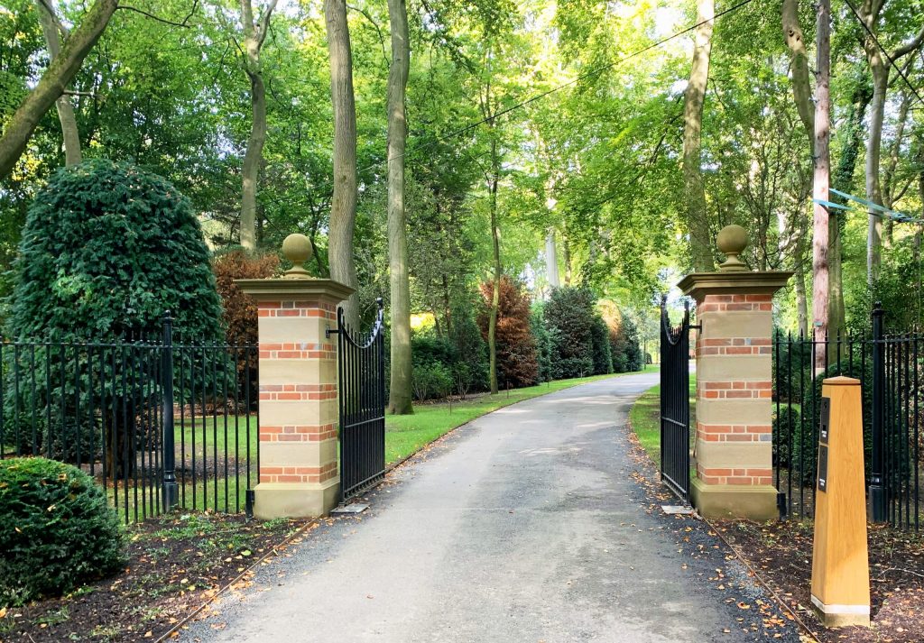 New stone and brick estate entrance gate piers