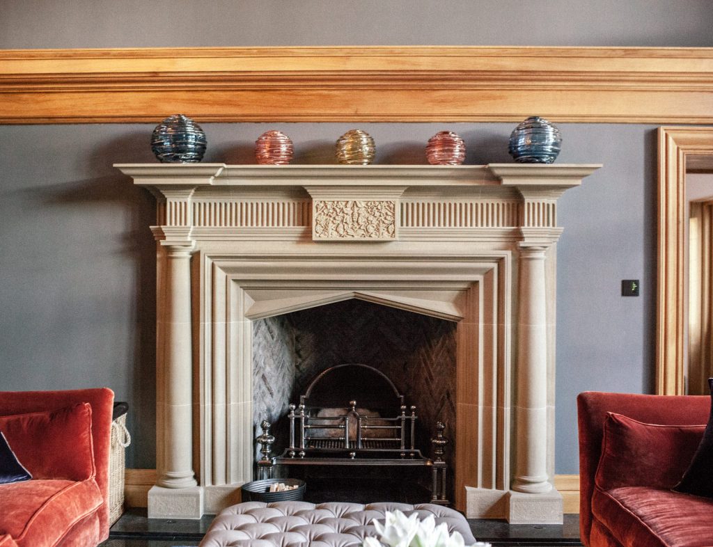 Central Stone Fireplace Ornate Classical stone carved fireplace