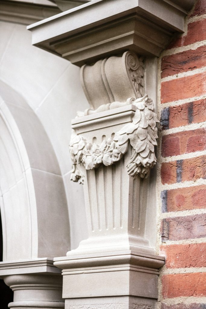 Stone Carved Classical Building Stone carved scroll corbel with floral swag
