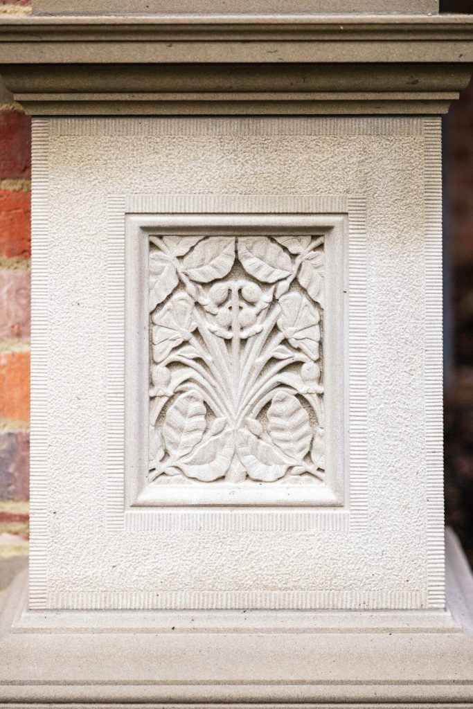 Floral stone Carving in Column Base Classical stone carving with British flora