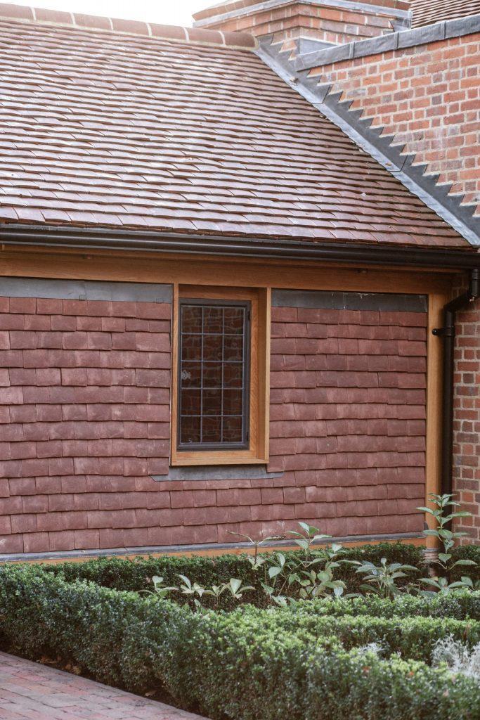Oak framed building with tile cladding New build outbuilding to residential home