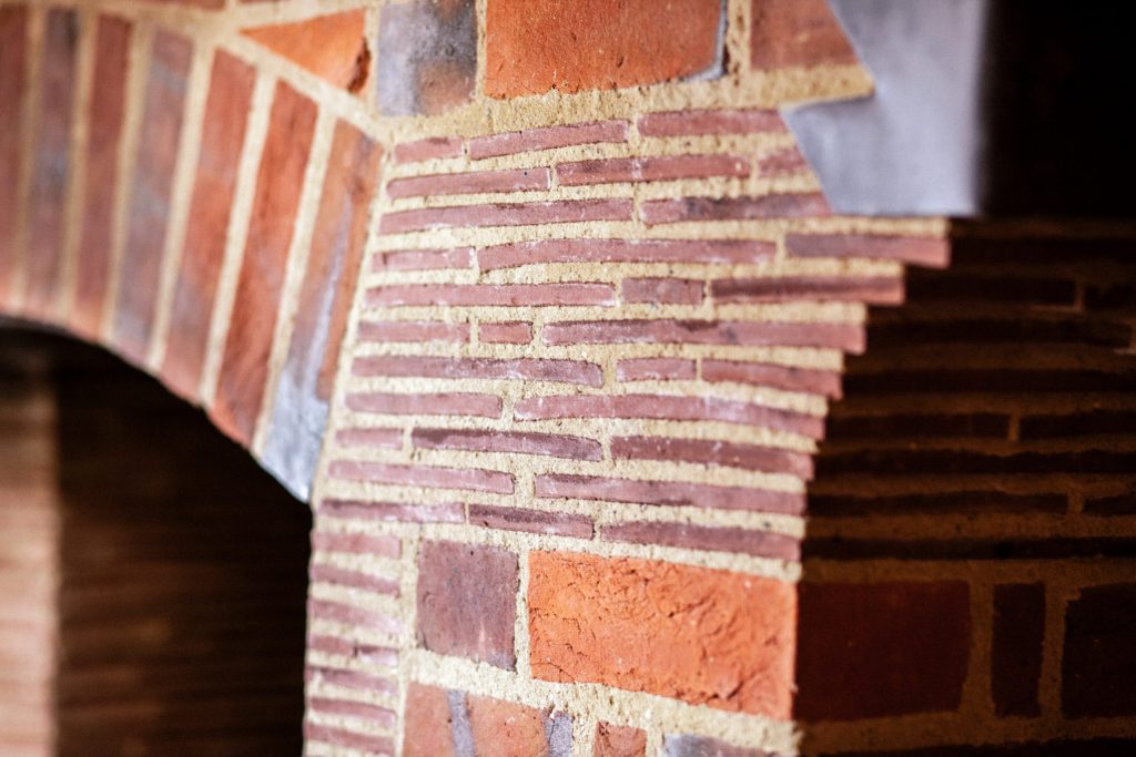 Arts and Crafts tile slips and brick fireplace Outdoor brick fireplace with tile slips