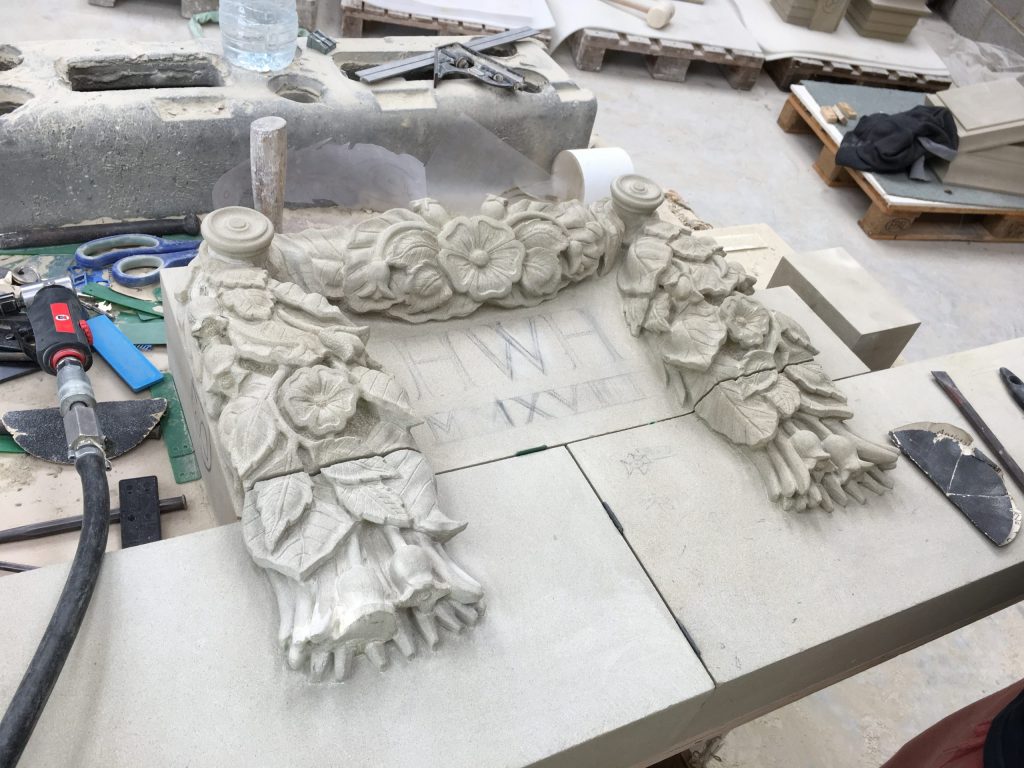 Arts and Crafts stone masonry carving in the UK