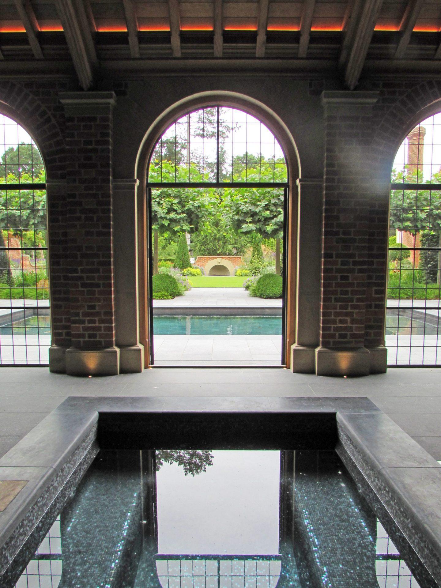 Oak tennis court pavilion building with bespoke lighting