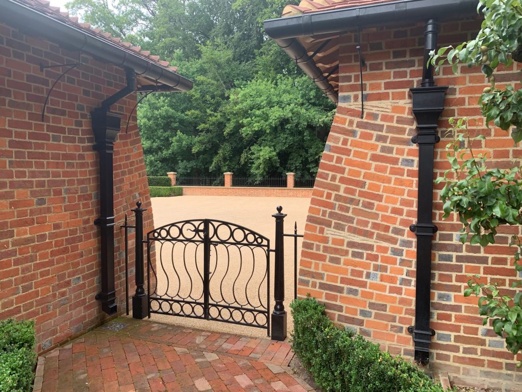 Bespoke Arts and Crafts metal gate design Bespoke garden gate design and brick buttress