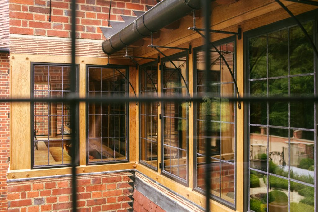 Arts and Crafts Oak windows with bronze casements