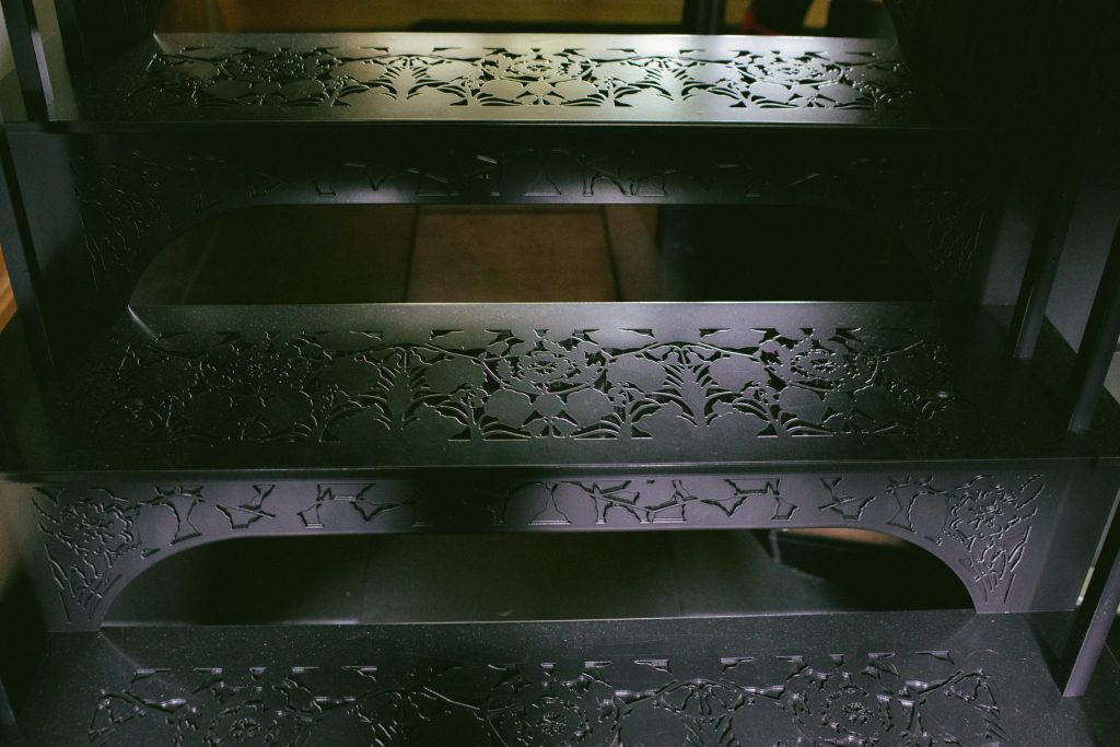 Steps with intricate metal detail on staircase Pretty black metal staircase treads