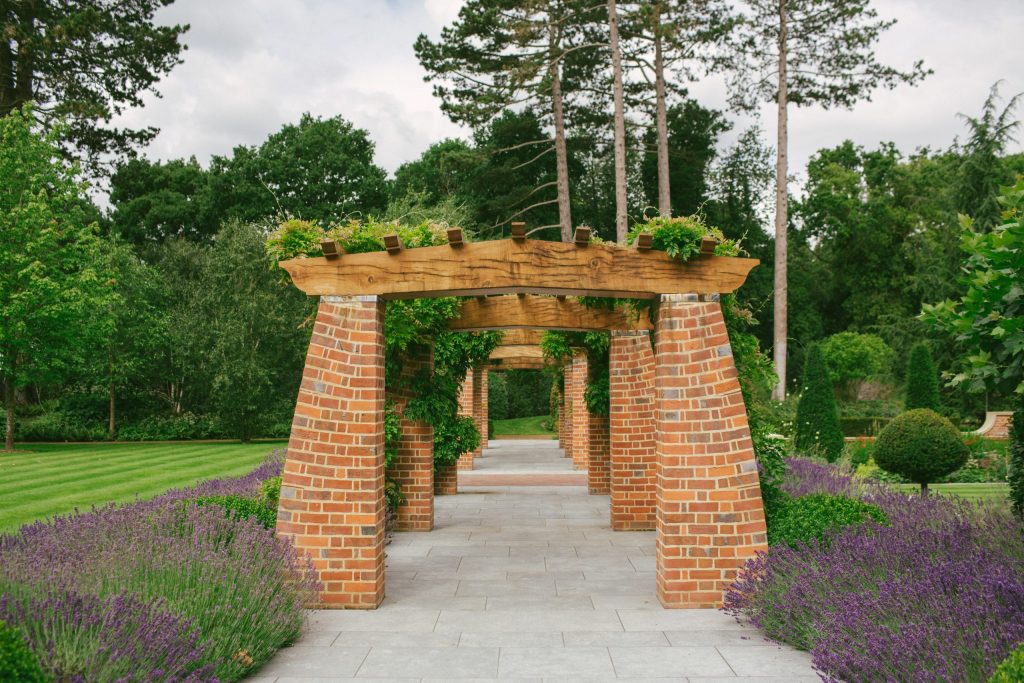 Arts and Crafts brick and Oak loggia design