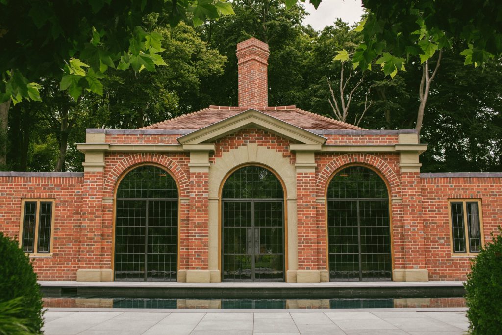 Classical pool house