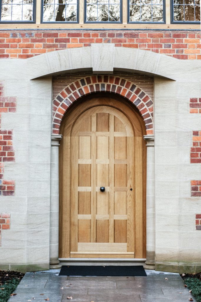 Oak front door to Arts and Crafts mansion