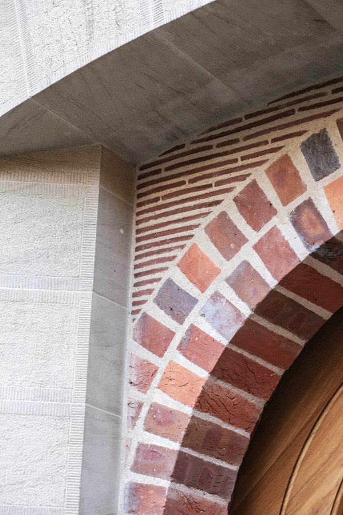 Arts and Crafts Brick Door Surround Brick stone and Oak front entrance porch