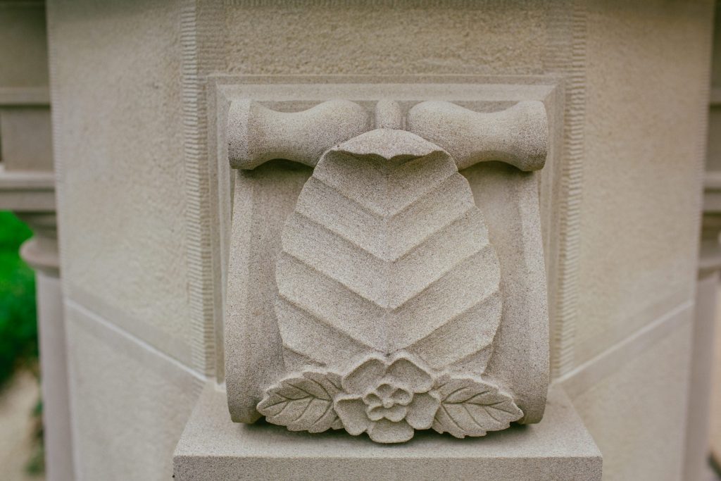 Stone Carved Scroll with Carved Beech Leaf Stone carving with British flowers and leaves