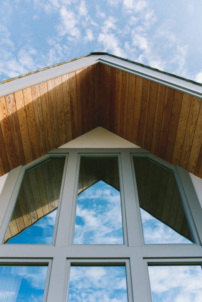 Overhanging Oak framed roof by classical Architect