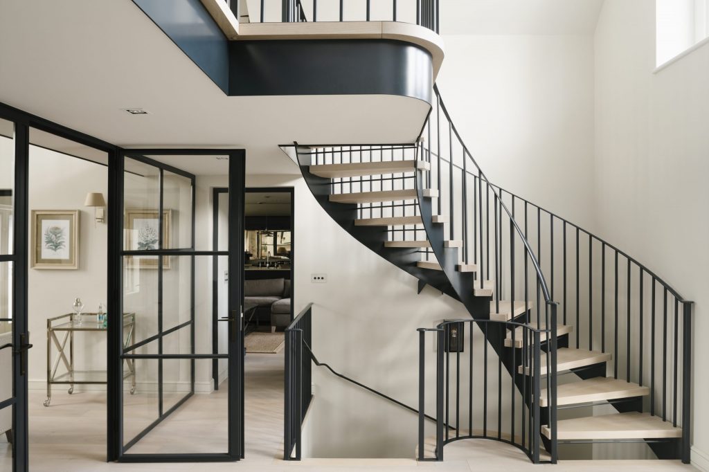 Modern metal and glass doors with matching staircase