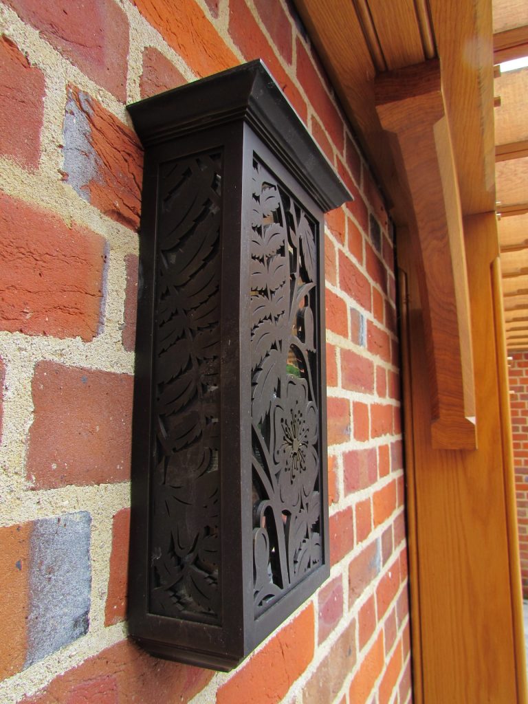 Bronze metal wall lights with bespoke decoration