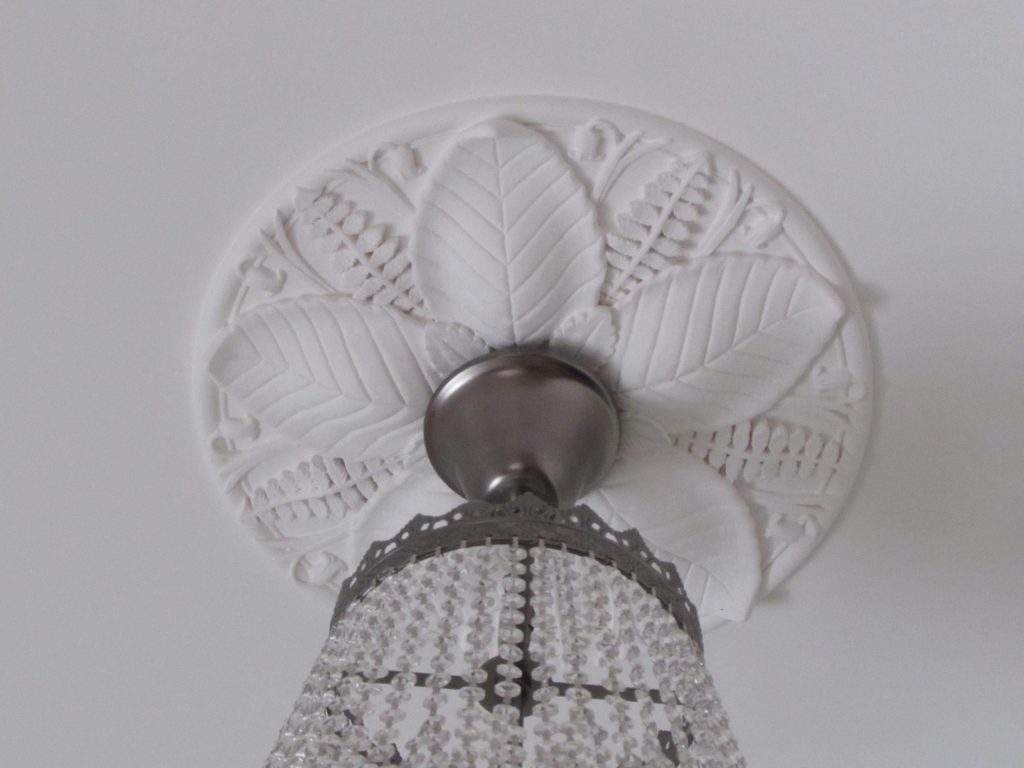 Bespoke plaster ceiling rose in bedroom Bespoke plaster ceiling rose for chandelier in bedroom