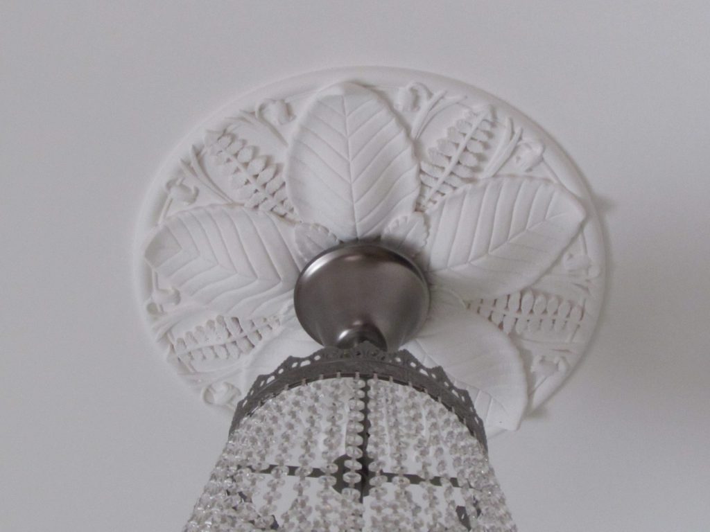 Bespoke plaster ceiling rose for chandelier in bedroom