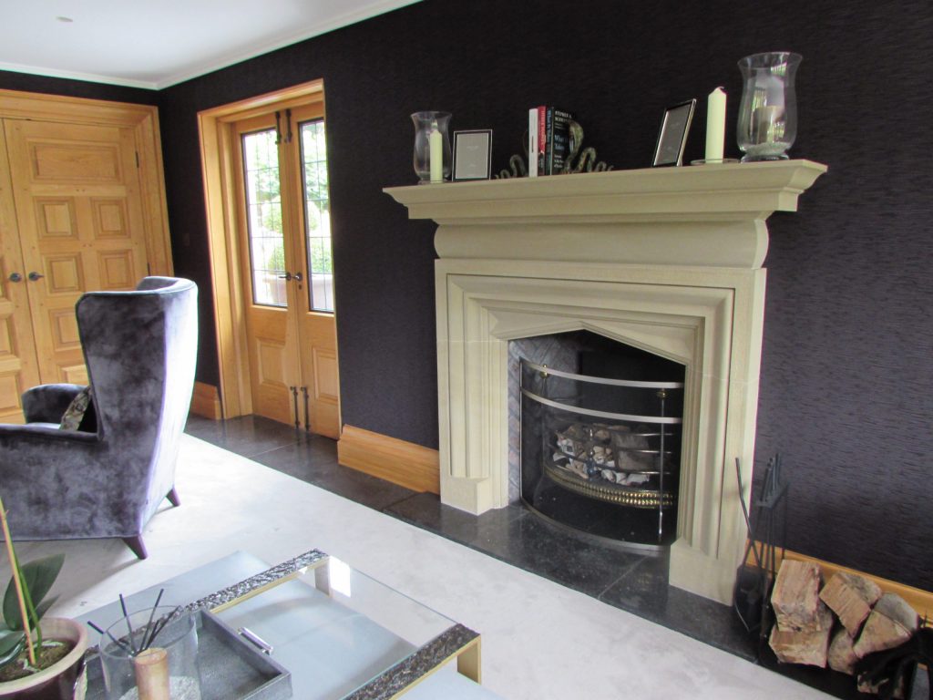 Bespoke stone fireplace surround in country house