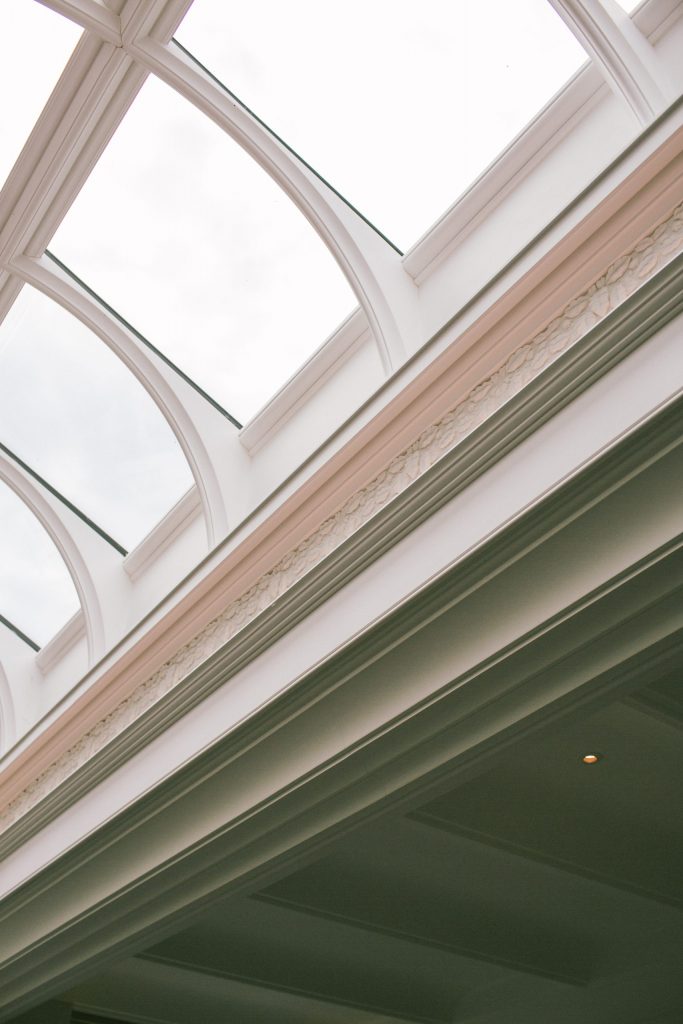 Classical orangery roof light with plasterwork and uplighting Classical ceiling moulding and roof light