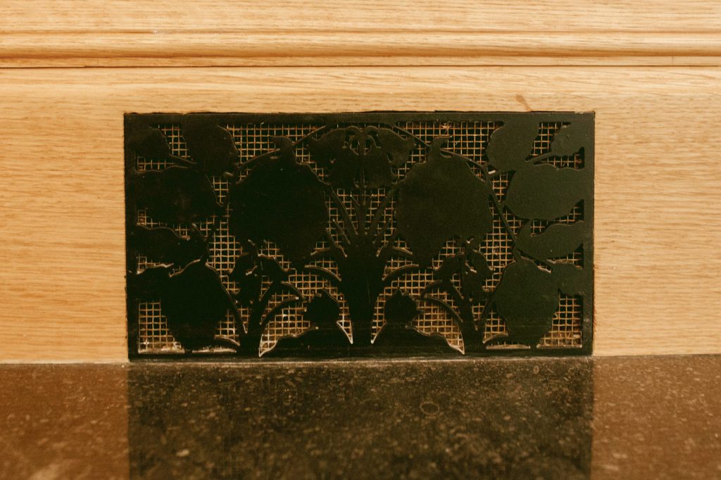 Bespoke metal decorative vent covers Bespoke metal vent cover in Oak skirting