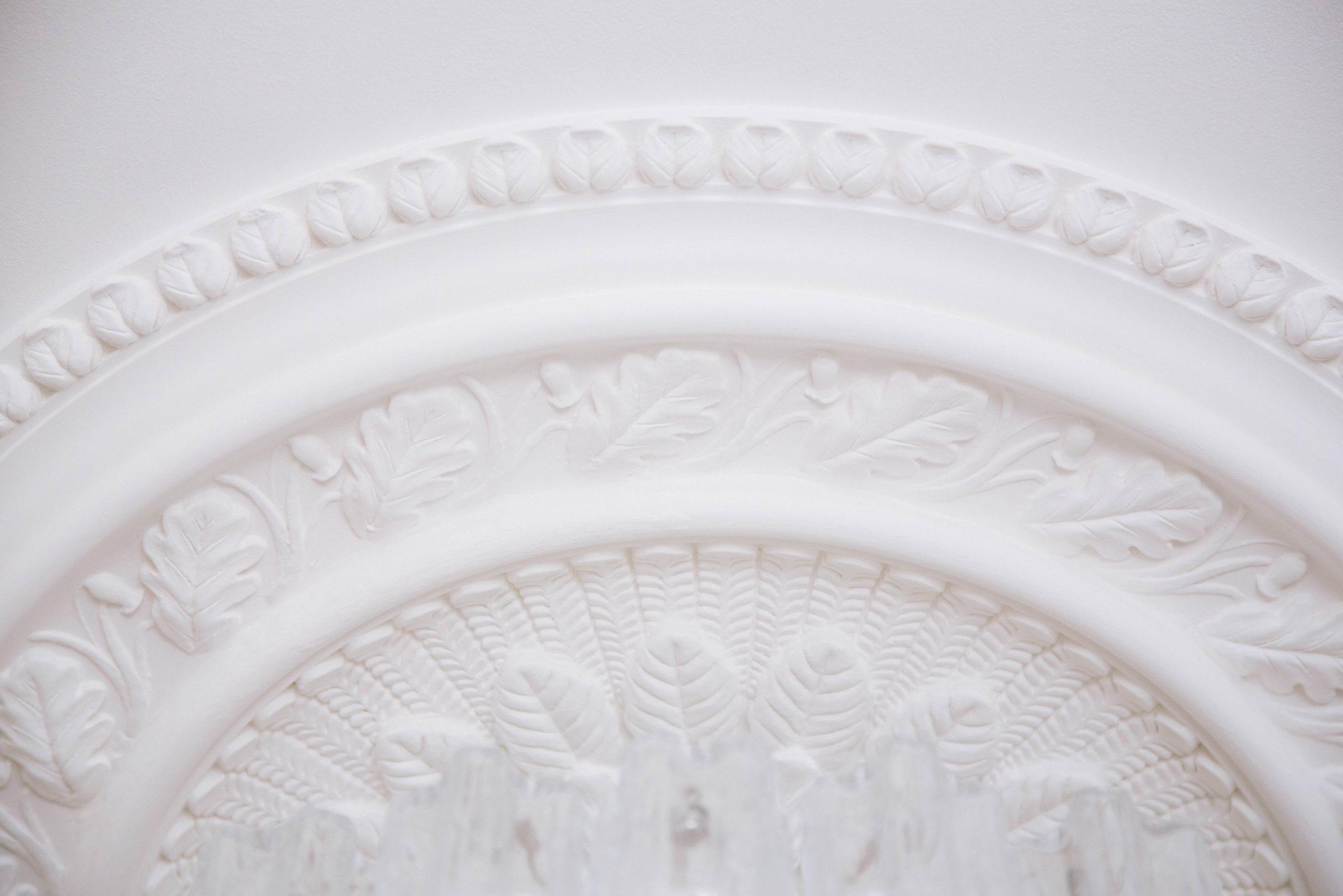 Classical stone carving with British flora