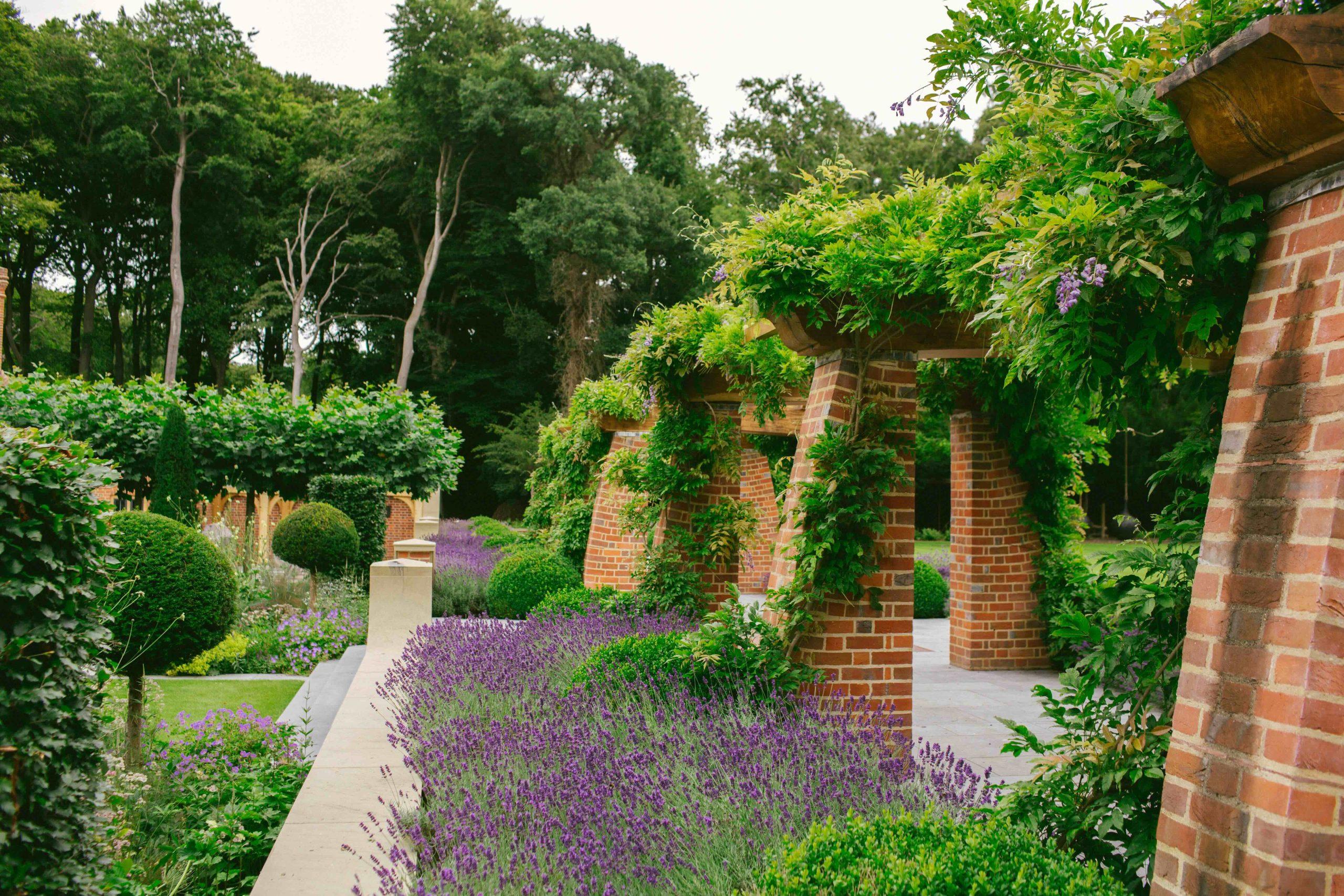 Country house Arts and Crafts garden wisteria