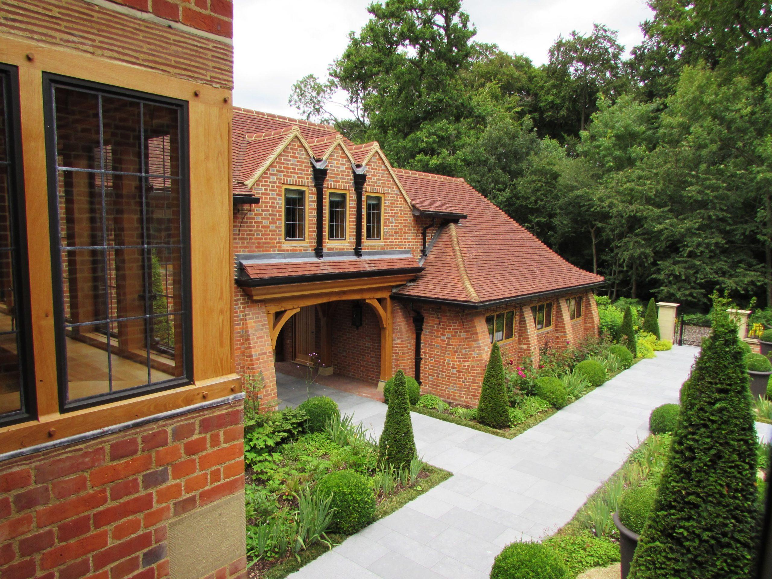 Arts and Crafts Oak windows with bronze casements