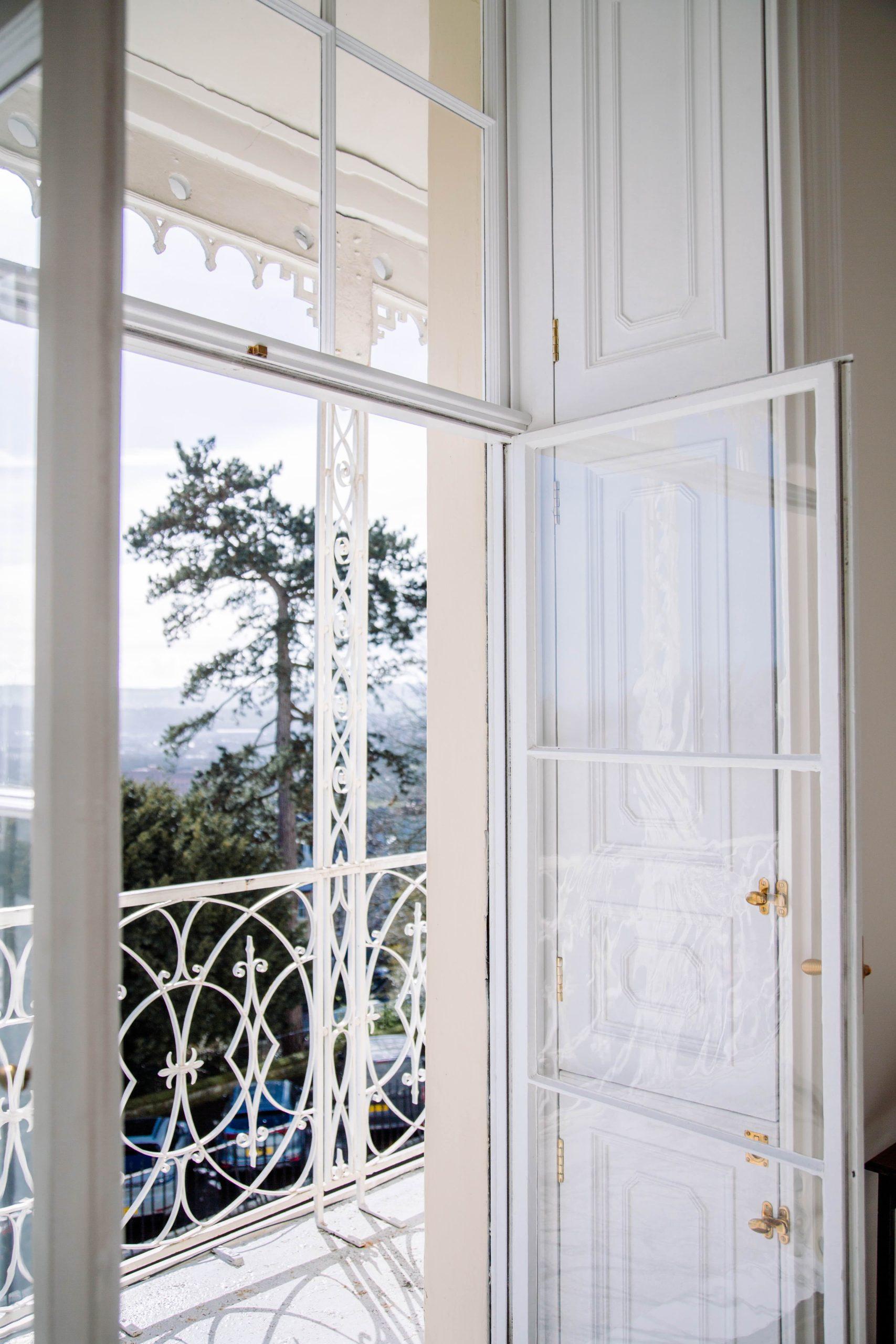A watercolour of the East elevation to an Arts and Crafts country house restoration and remodelling project in the Quantocks. Painted by Jonathan Lees.