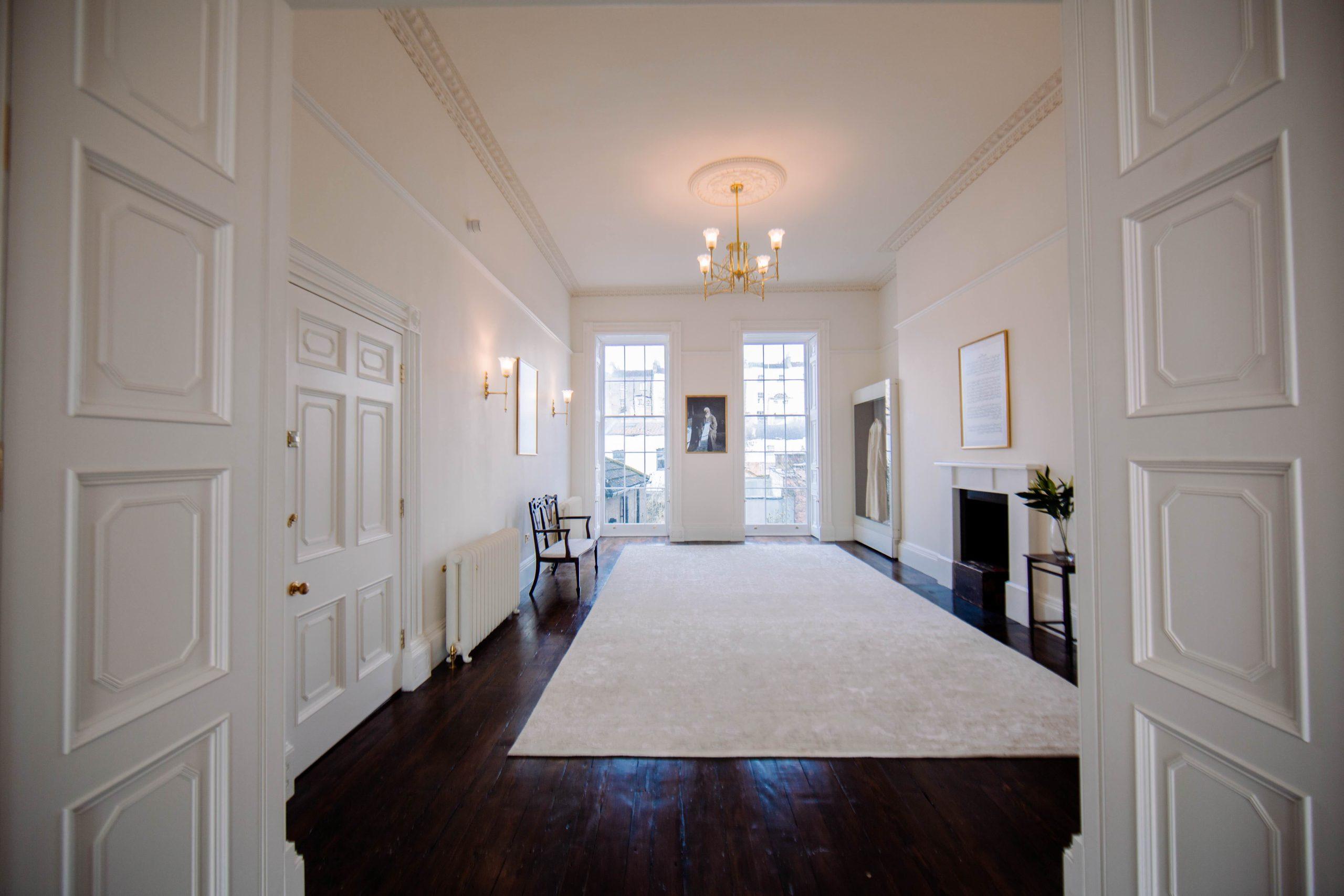 Classical stone and brick garden building with carved details