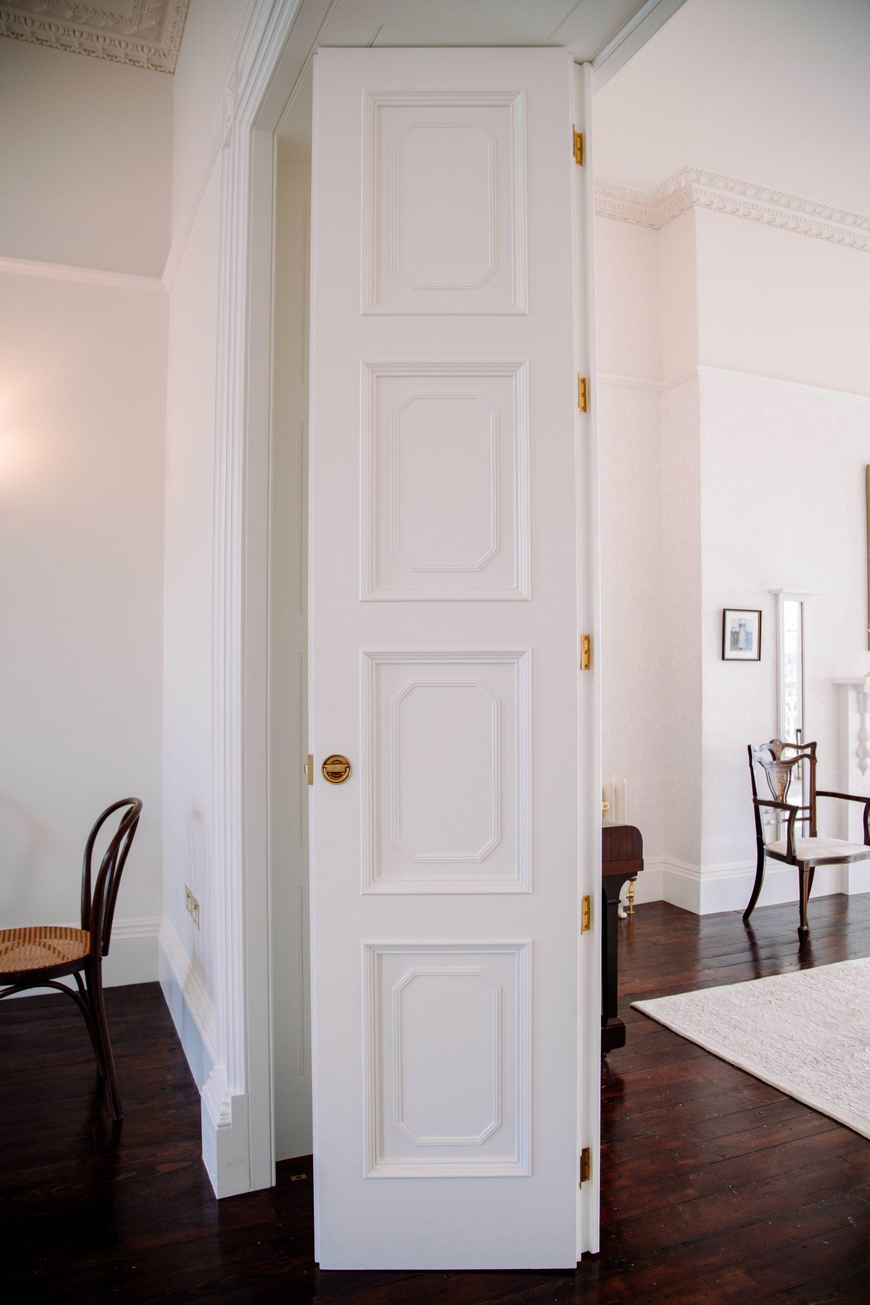 A watercolour of the East elevation to an Arts and Crafts country house restoration and remodelling project in the Quantocks. Painted by Jonathan Lees.