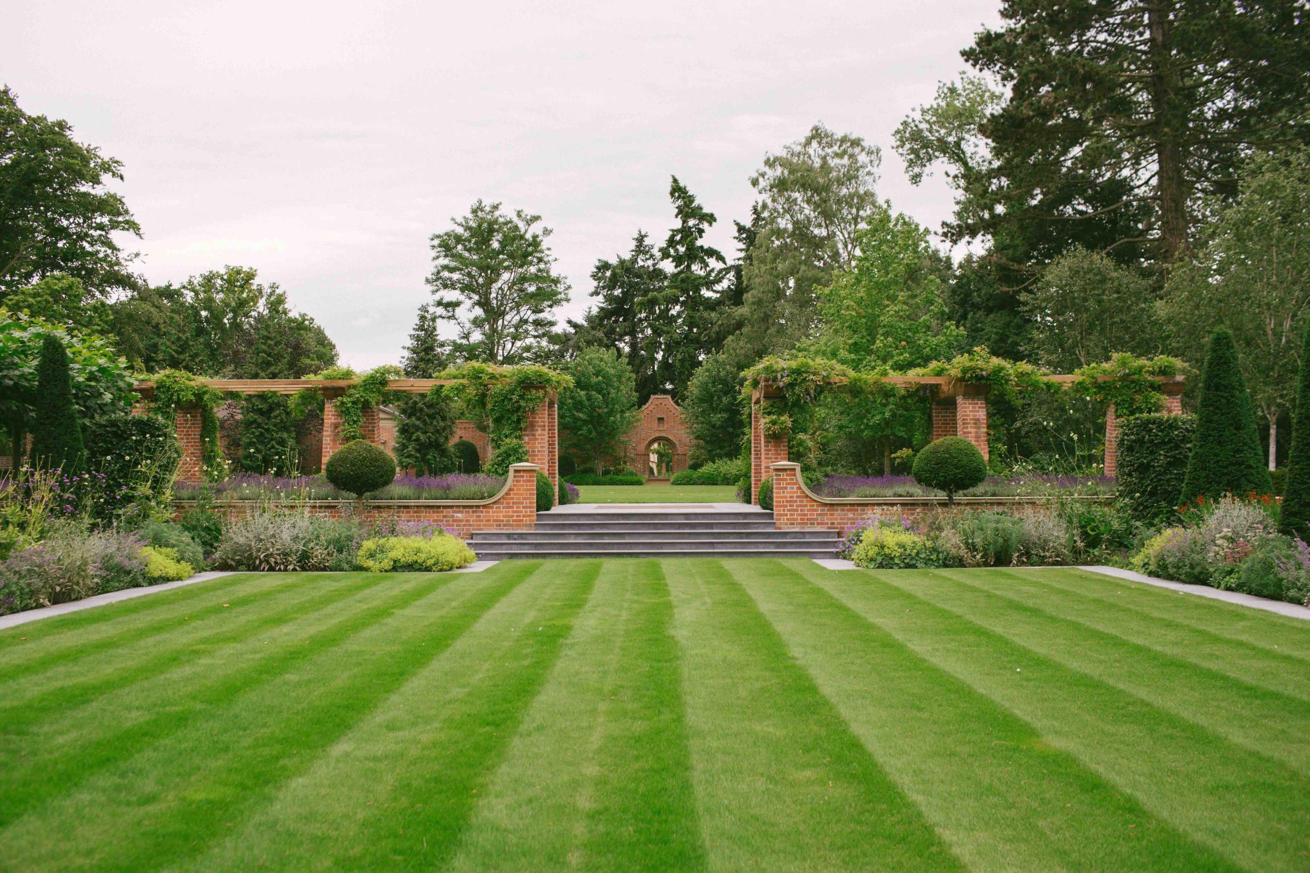 Naturalistic planting in arts and crafts country garden