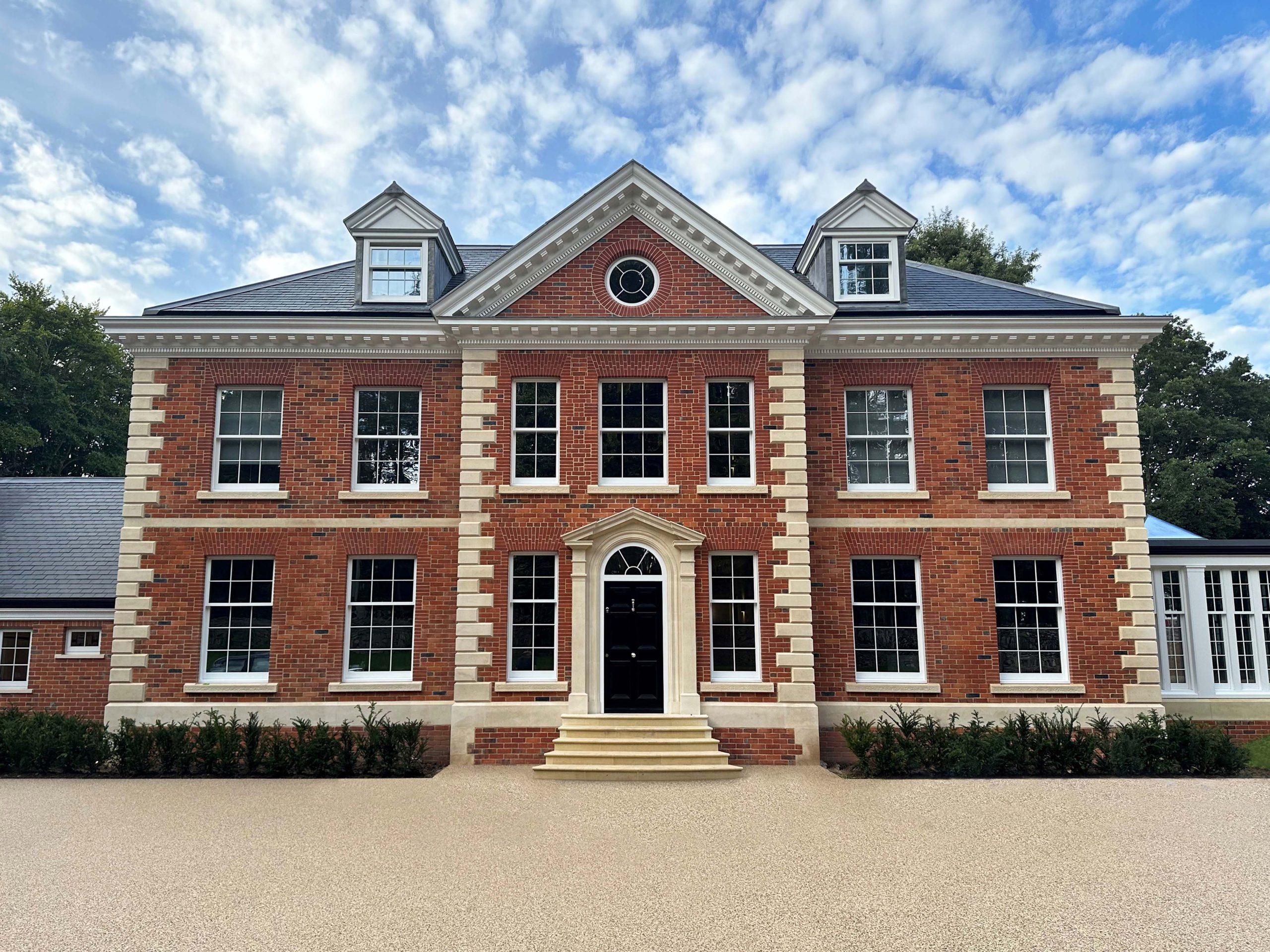 A watercolour of the East elevation to an Arts and Crafts country house restoration and remodelling project in the Quantocks. Painted by Jonathan Lees.