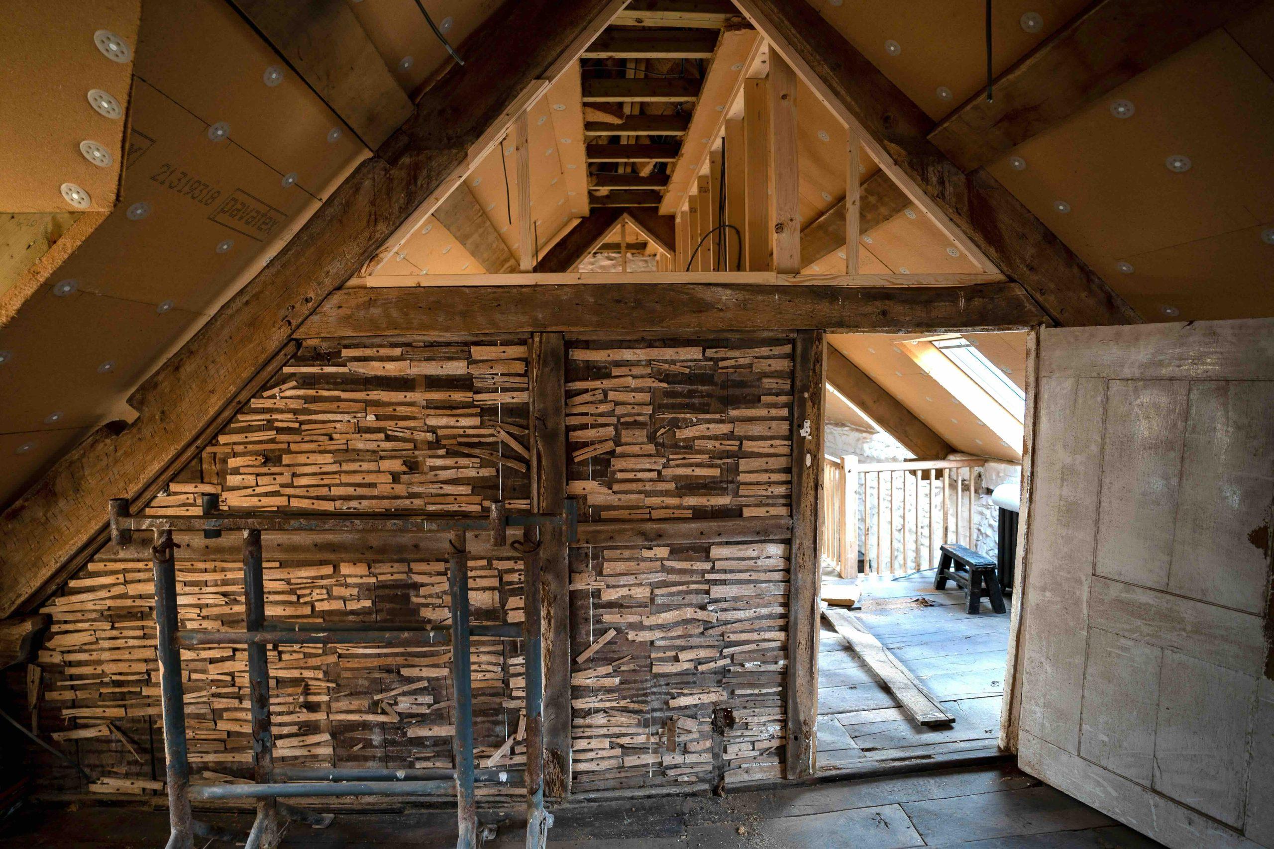 Historic Lath and Plaster walls revealed in the restoration of the historic Welsh longhouse.