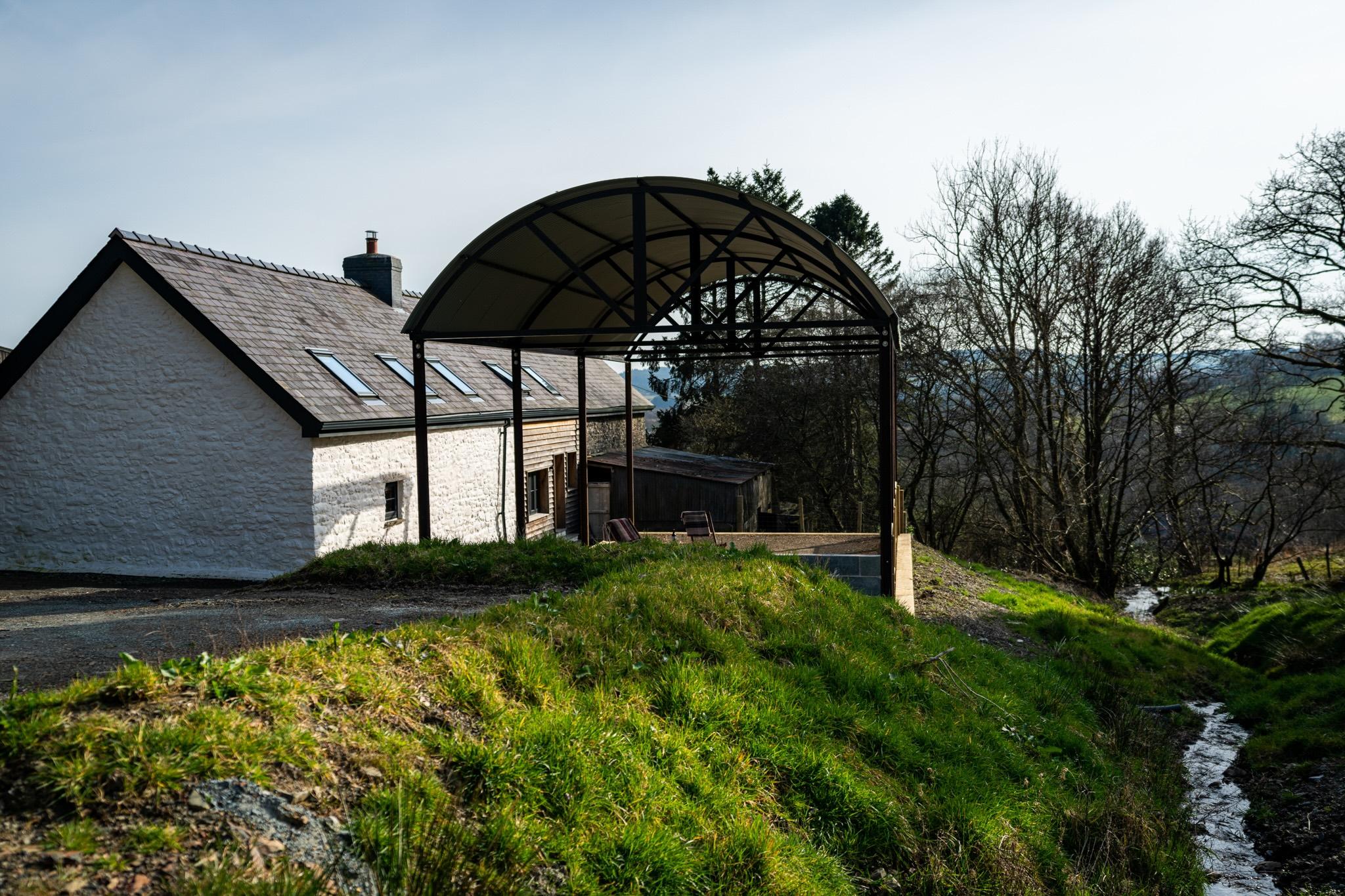 The rear of a restored 17th century Welsh farmhouse.